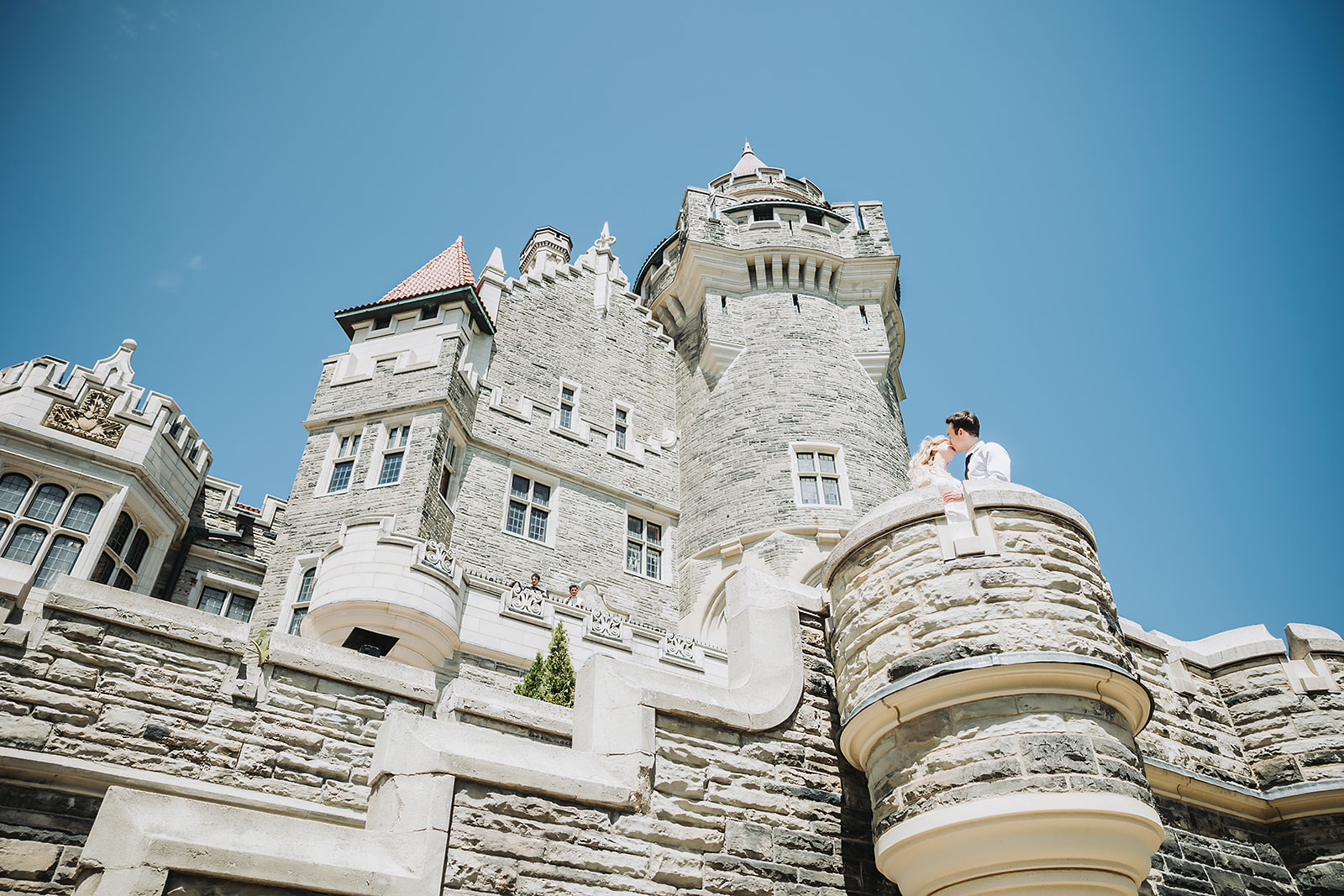 Romantic Casa Loma wedding photo with historic castle architecture