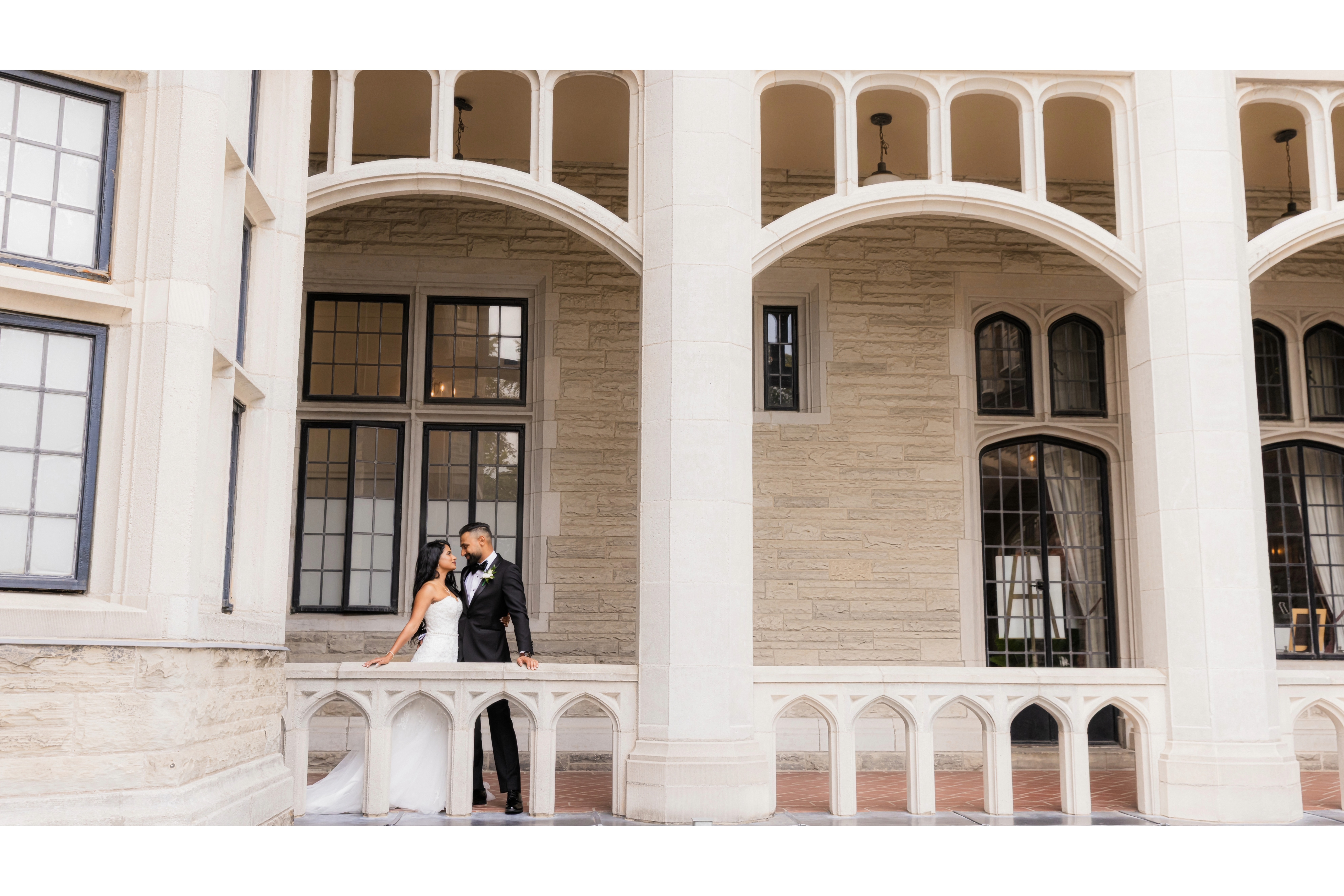 Elegant bride and groom portraits at Casa Loma Toronto during sunset wedding session